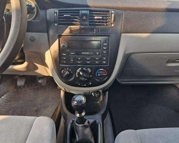 Синий Шевроле Лачетти, объемом двигателя 1.6 л и пробегом 207 тыс. км за 3900 $, фото 14 на Automoto.ua