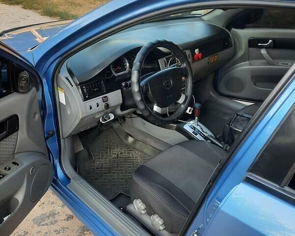 Синий Шевроле Лачетти, объемом двигателя 1.82 л и пробегом 270 тыс. км за 4200 $, фото 4 на Automoto.ua