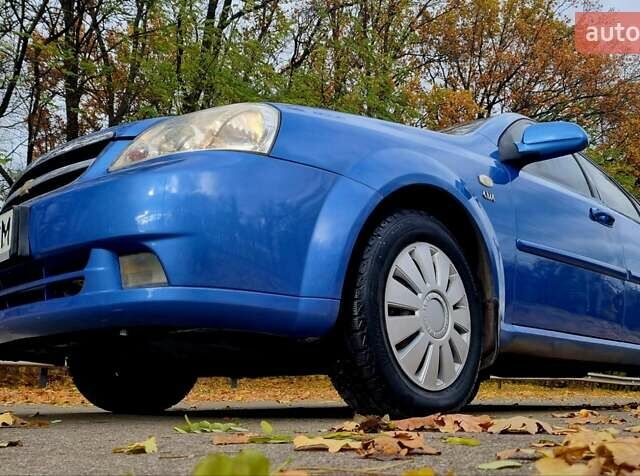 Синій Шевроле Лачетті, об'ємом двигуна 1.8 л та пробігом 280 тис. км за 4500 $, фото 21 на Automoto.ua