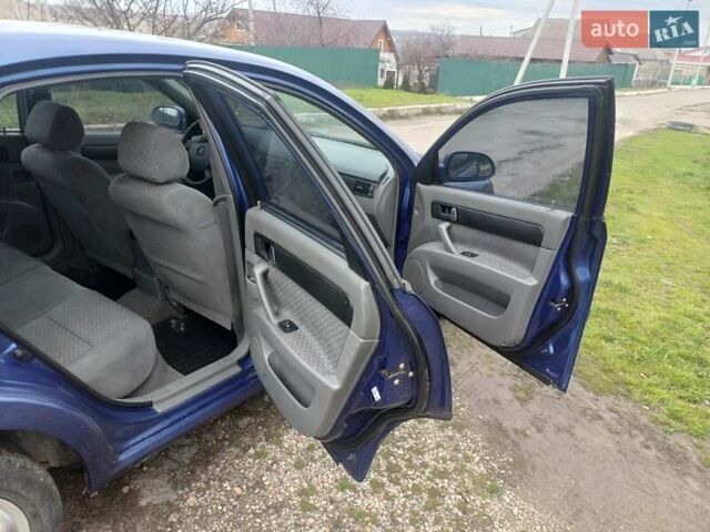 Синій Шевроле Лачетті, об'ємом двигуна 1.8 л та пробігом 186 тис. км за 3950 $, фото 14 на Automoto.ua