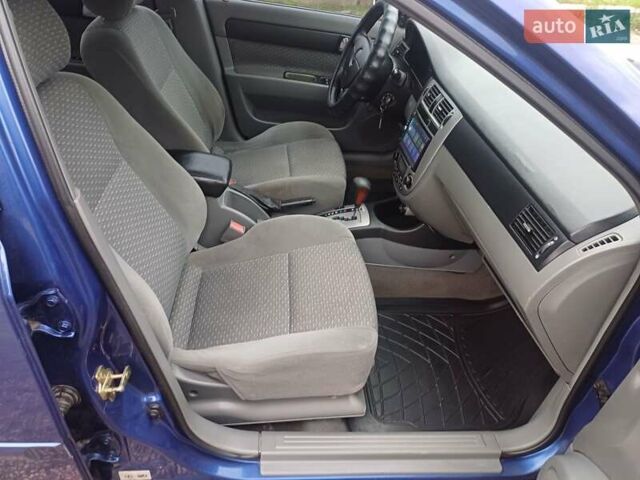 Синій Шевроле Лачетті, об'ємом двигуна 1.8 л та пробігом 186 тис. км за 3950 $, фото 12 на Automoto.ua