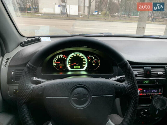 Синий Шевроле Лачетти, объемом двигателя 1.8 л и пробегом 318 тыс. км за 4000 $, фото 18 на Automoto.ua