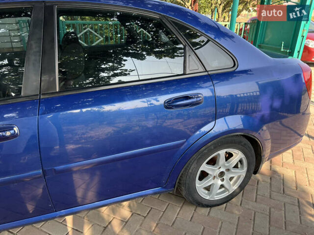 Синий Шевроле Лачетти, объемом двигателя 1.8 л и пробегом 230 тыс. км за 4000 $, фото 4 на Automoto.ua
