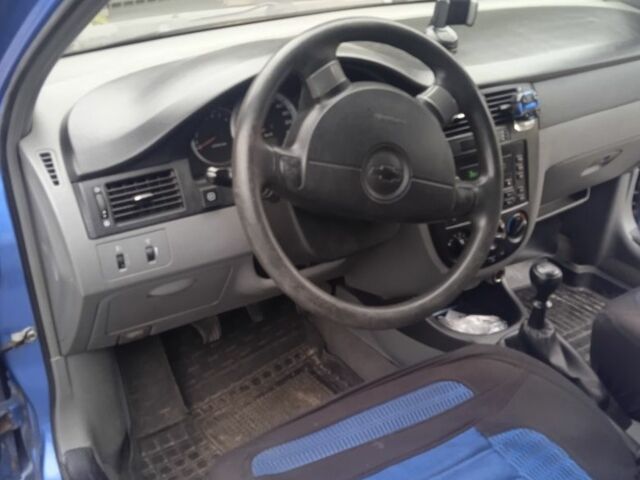 Синій Шевроле Лачетті, об'ємом двигуна 1.6 л та пробігом 345 тис. км за 2999 $, фото 10 на Automoto.ua