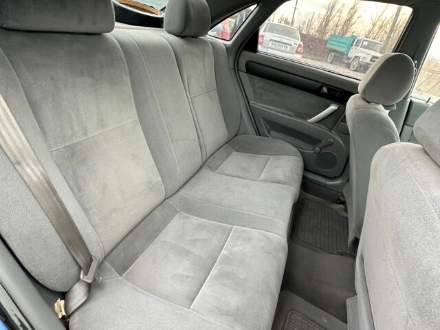 Синий Шевроле Лачетти, объемом двигателя 1.6 л и пробегом 307 тыс. км за 3700 $, фото 2 на Automoto.ua