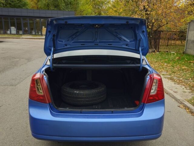 Синій Шевроле Лачетті, об'ємом двигуна 1.6 л та пробігом 230 тис. км за 3350 $, фото 3 на Automoto.ua