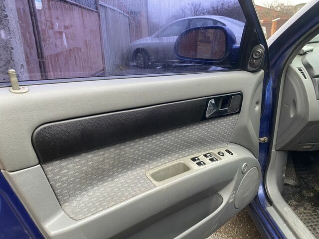 Синий Шевроле Лачетти, объемом двигателя 1.8 л и пробегом 200 тыс. км за 3200 $, фото 8 на Automoto.ua