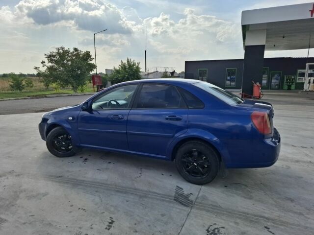 Синий Шевроле Лачетти, объемом двигателя 1.8 л и пробегом 275 тыс. км за 3550 $, фото 5 на Automoto.ua