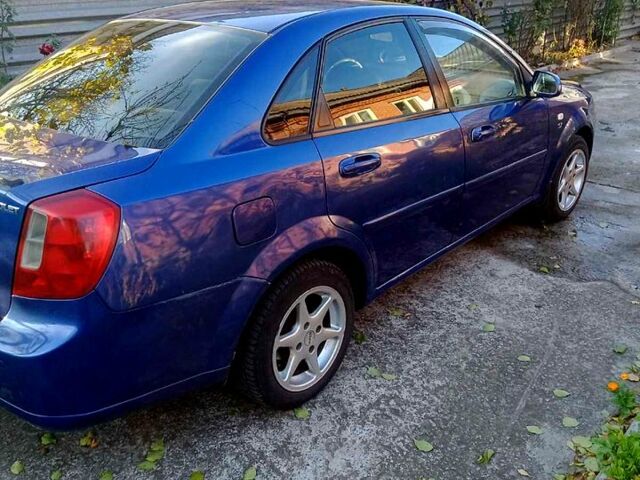 Синий Шевроле Лачетти, объемом двигателя 1.8 л и пробегом 252 тыс. км за 2800 $, фото 11 на Automoto.ua