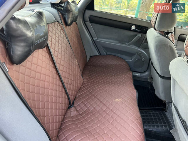 Синий Шевроле Лачетти, объемом двигателя 1.8 л и пробегом 230 тыс. км за 4000 $, фото 9 на Automoto.ua