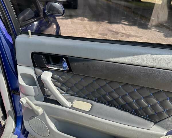 Синий Шевроле Лачетти, объемом двигателя 1.6 л и пробегом 240 тыс. км за 4000 $, фото 15 на Automoto.ua