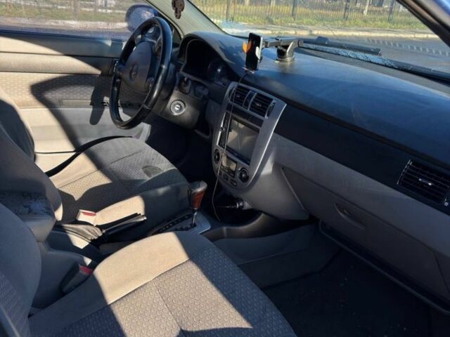 Синий Шевроле Лачетти, объемом двигателя 1.8 л и пробегом 319 тыс. км за 3500 $, фото 6 на Automoto.ua