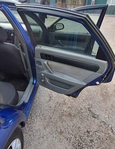 Синій Шевроле Лачетті, об'ємом двигуна 1.6 л та пробігом 225 тис. км за 4400 $, фото 13 на Automoto.ua