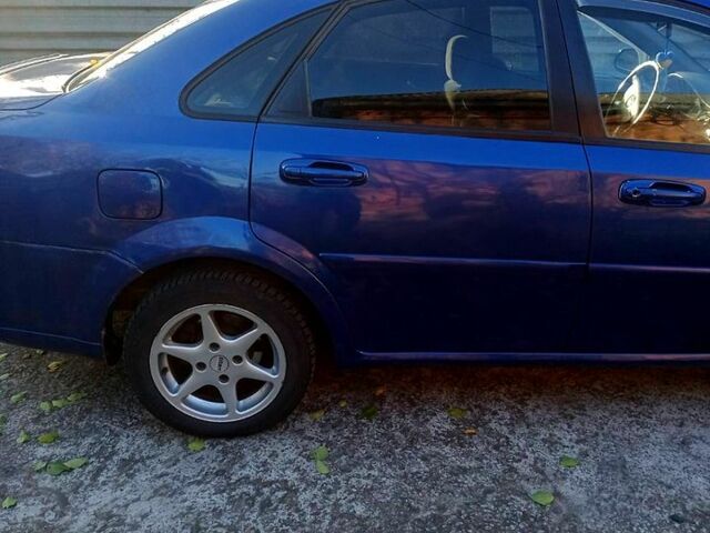 Синий Шевроле Лачетти, объемом двигателя 1.8 л и пробегом 252 тыс. км за 2800 $, фото 9 на Automoto.ua