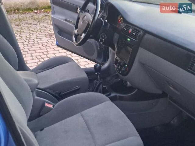 Синий Шевроле Лачетти, объемом двигателя 1.8 л и пробегом 148 тыс. км за 2999 $, фото 18 на Automoto.ua