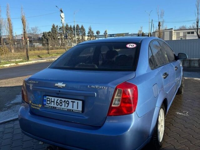Синий Шевроле Лачетти, объемом двигателя 1.8 л и пробегом 319 тыс. км за 3500 $, фото 1 на Automoto.ua