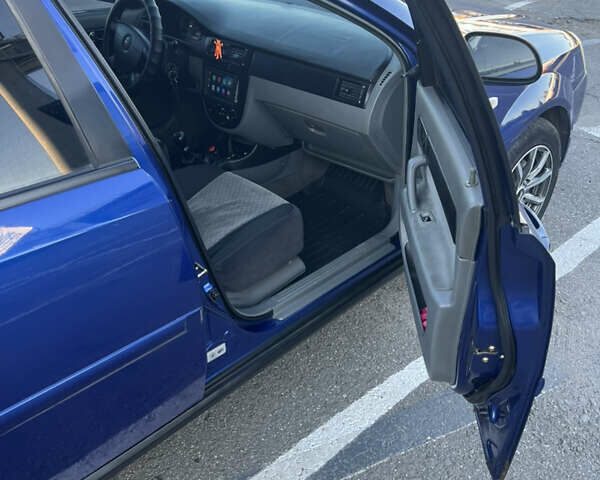 Синій Шевроле Лачетті, об'ємом двигуна 1.6 л та пробігом 294 тис. км за 3000 $, фото 9 на Automoto.ua