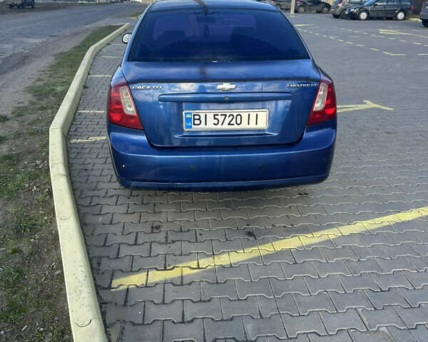 Синий Шевроле Лачетти, объемом двигателя 1.8 л и пробегом 330 тыс. км за 3500 $, фото 4 на Automoto.ua