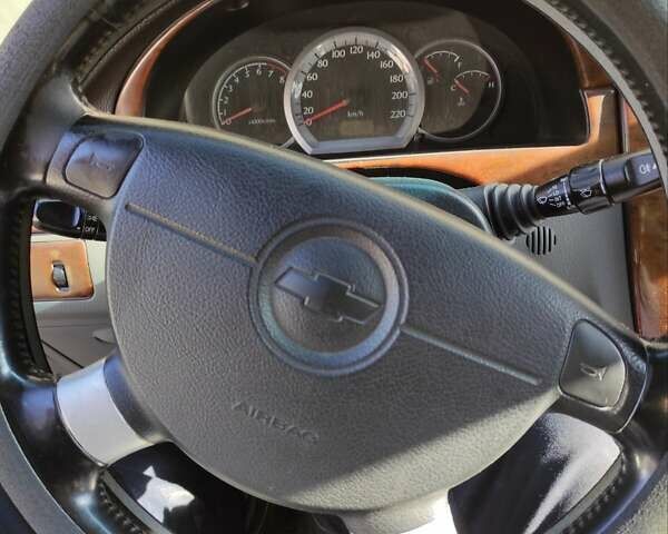 Синий Шевроле Лачетти, объемом двигателя 1.8 л и пробегом 148 тыс. км за 3000 $, фото 1 на Automoto.ua