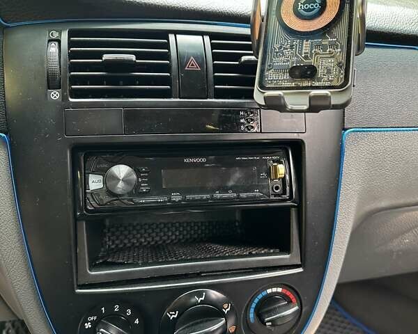 Синий Шевроле Лачетти, объемом двигателя 1.6 л и пробегом 240 тыс. км за 4000 $, фото 6 на Automoto.ua