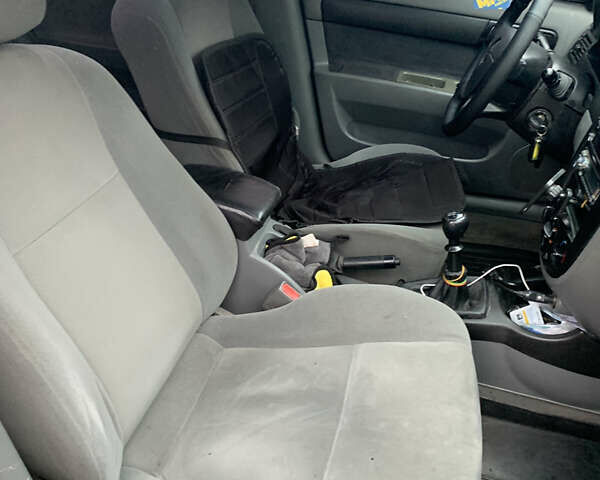 Синий Шевроле Лачетти, объемом двигателя 1.8 л и пробегом 318 тыс. км за 4000 $, фото 12 на Automoto.ua