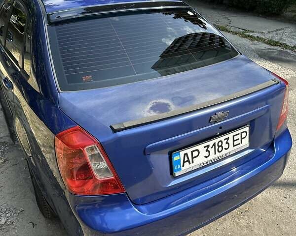 Синий Шевроле Лачетти, объемом двигателя 1.6 л и пробегом 240 тыс. км за 4000 $, фото 2 на Automoto.ua