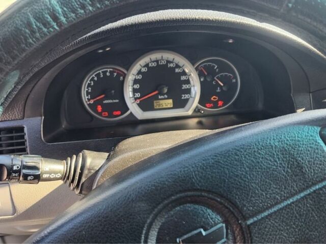 Синий Шевроле Лачетти, объемом двигателя 1.8 л и пробегом 285 тыс. км за 3000 $, фото 6 на Automoto.ua