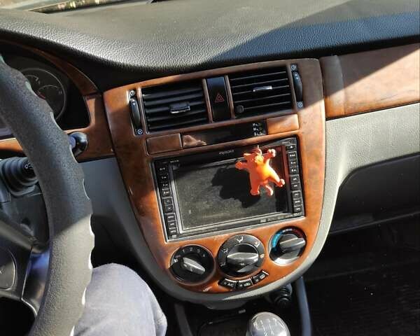 Синий Шевроле Лачетти, объемом двигателя 1.8 л и пробегом 148 тыс. км за 3000 $, фото 8 на Automoto.ua