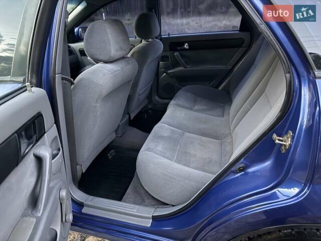 Синий Шевроле Лачетти, объемом двигателя 1.8 л и пробегом 187 тыс. км за 4000 $, фото 12 на Automoto.ua