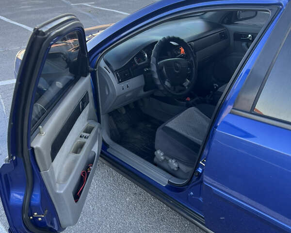 Синій Шевроле Лачетті, об'ємом двигуна 1.6 л та пробігом 294 тис. км за 3000 $, фото 6 на Automoto.ua