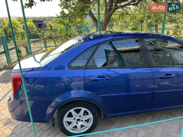 Синий Шевроле Лачетти, объемом двигателя 1.8 л и пробегом 230 тыс. км за 4000 $, фото 6 на Automoto.ua