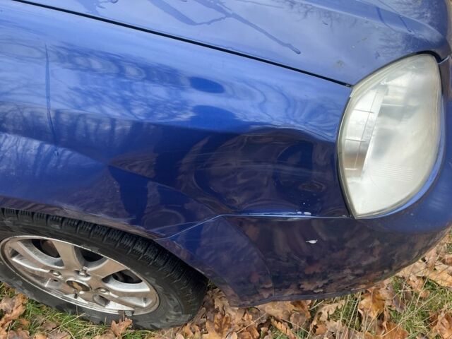 Синий Шевроле Лачетти, объемом двигателя 1.6 л и пробегом 217 тыс. км за 2500 $, фото 22 на Automoto.ua