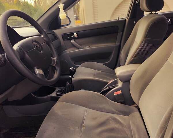 Синий Шевроле Лачетти, объемом двигателя 1.8 л и пробегом 270 тыс. км за 2800 $, фото 10 на Automoto.ua