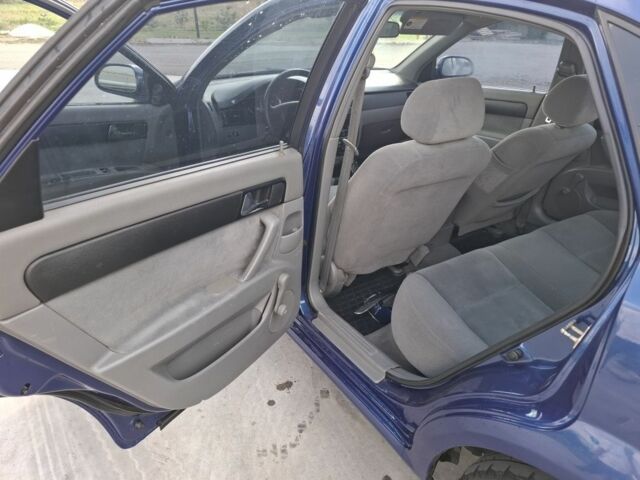 Синий Шевроле Лачетти, объемом двигателя 1.8 л и пробегом 275 тыс. км за 3550 $, фото 7 на Automoto.ua