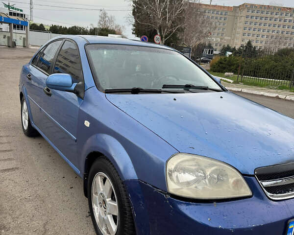 Синий Шевроле Лачетти, объемом двигателя 1.8 л и пробегом 320 тыс. км за 3500 $, фото 2 на Automoto.ua