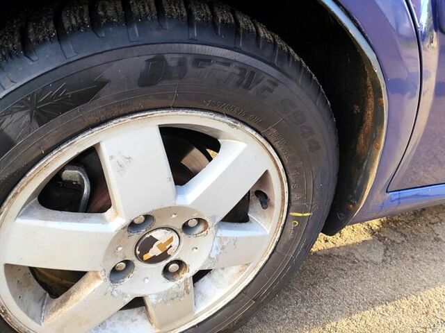 Синий Шевроле Лачетти, объемом двигателя 1.8 л и пробегом 200 тыс. км за 4600 $, фото 4 на Automoto.ua