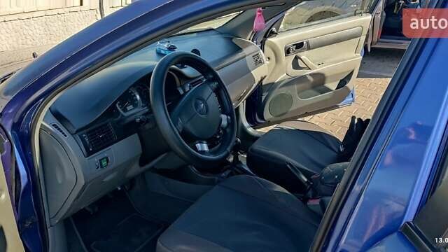 Синій Шевроле Лачетті, об'ємом двигуна 1.6 л та пробігом 433 тис. км за 3900 $, фото 14 на Automoto.ua