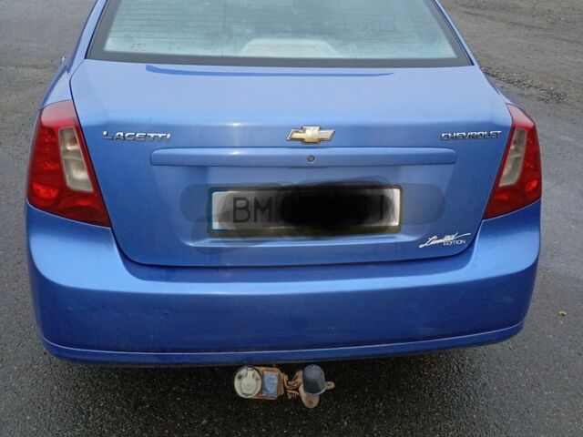 Синий Шевроле Лачетти, объемом двигателя 1 л и пробегом 170 тыс. км за 4000 $, фото 1 на Automoto.ua