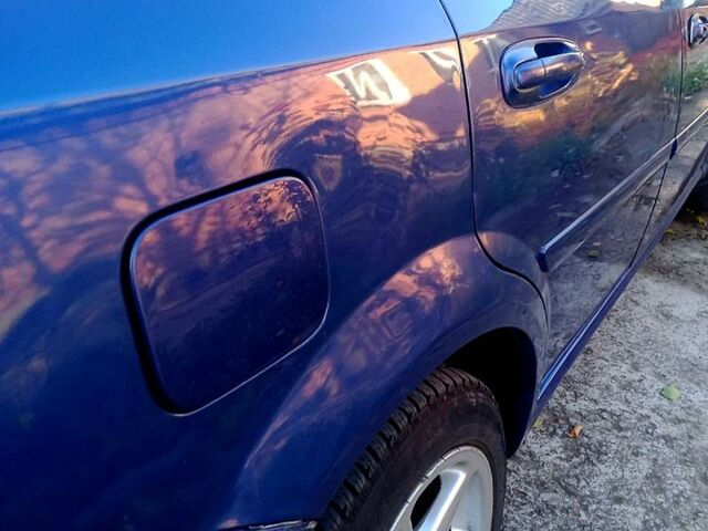 Синий Шевроле Лачетти, объемом двигателя 1.8 л и пробегом 252 тыс. км за 2800 $, фото 12 на Automoto.ua