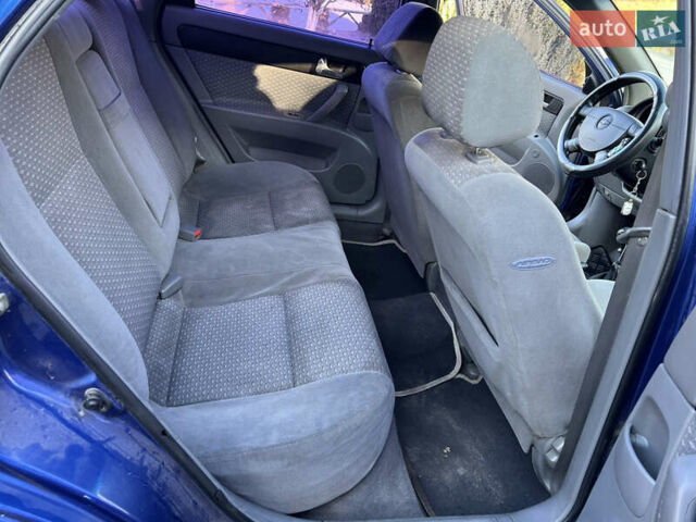 Синій Шевроле Лачетті, об'ємом двигуна 1.8 л та пробігом 330 тис. км за 2999 $, фото 11 на Automoto.ua