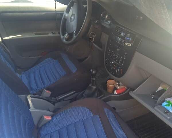 Синий Шевроле Лачетти, объемом двигателя 1.6 л и пробегом 300 тыс. км за 3300 $, фото 1 на Automoto.ua