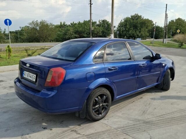 Синий Шевроле Лачетти, объемом двигателя 1.8 л и пробегом 275 тыс. км за 3550 $, фото 4 на Automoto.ua