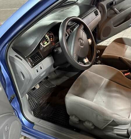 Синій Шевроле Лачетті, об'ємом двигуна 1.6 л та пробігом 159 тис. км за 3755 $, фото 9 на Automoto.ua