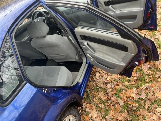 Синий Шевроле Лачетти, объемом двигателя 1.6 л и пробегом 217 тыс. км за 2500 $, фото 9 на Automoto.ua