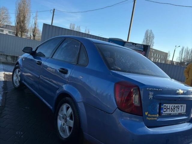 Синий Шевроле Лачетти, объемом двигателя 1.8 л и пробегом 319 тыс. км за 3500 $, фото 2 на Automoto.ua