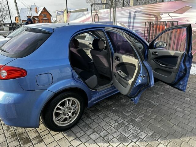 Синий Шевроле Лачетти, объемом двигателя 1.8 л и пробегом 147 тыс. км за 1799 $, фото 4 на Automoto.ua