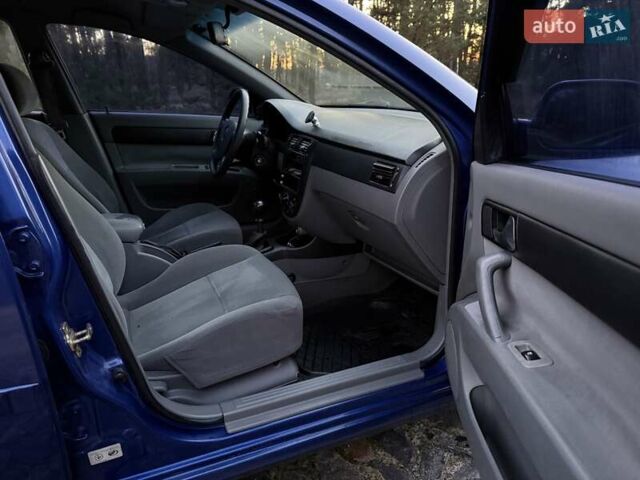 Синий Шевроле Лачетти, объемом двигателя 1.8 л и пробегом 187 тыс. км за 4000 $, фото 16 на Automoto.ua