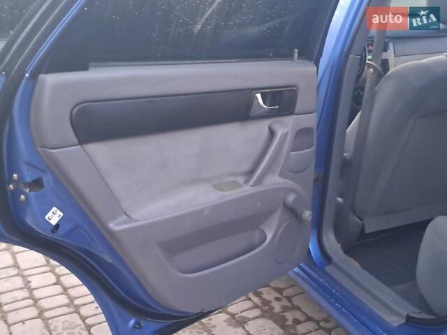 Синий Шевроле Лачетти, объемом двигателя 1.8 л и пробегом 148 тыс. км за 2999 $, фото 23 на Automoto.ua