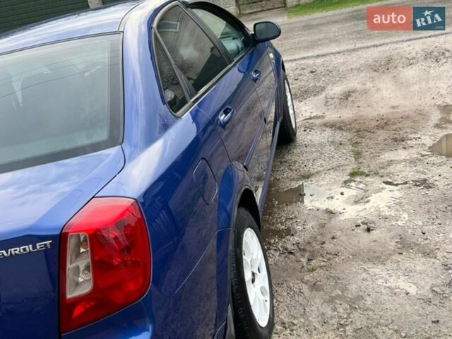 Синій Шевроле Лачетті, об'ємом двигуна 1.8 л та пробігом 259 тис. км за 3499 $, фото 4 на Automoto.ua