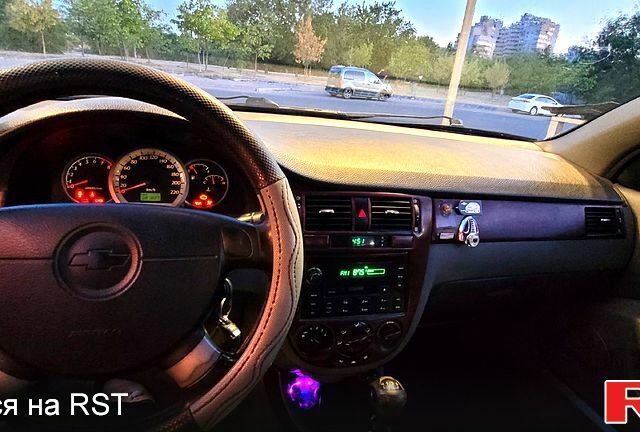 Синий Шевроле Лачетти, объемом двигателя 1.8 л и пробегом 382 тыс. км за 4000 $, фото 3 на Automoto.ua